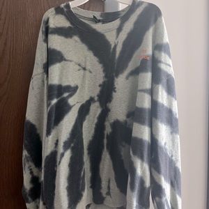 Sweater with graphic letters on the right side